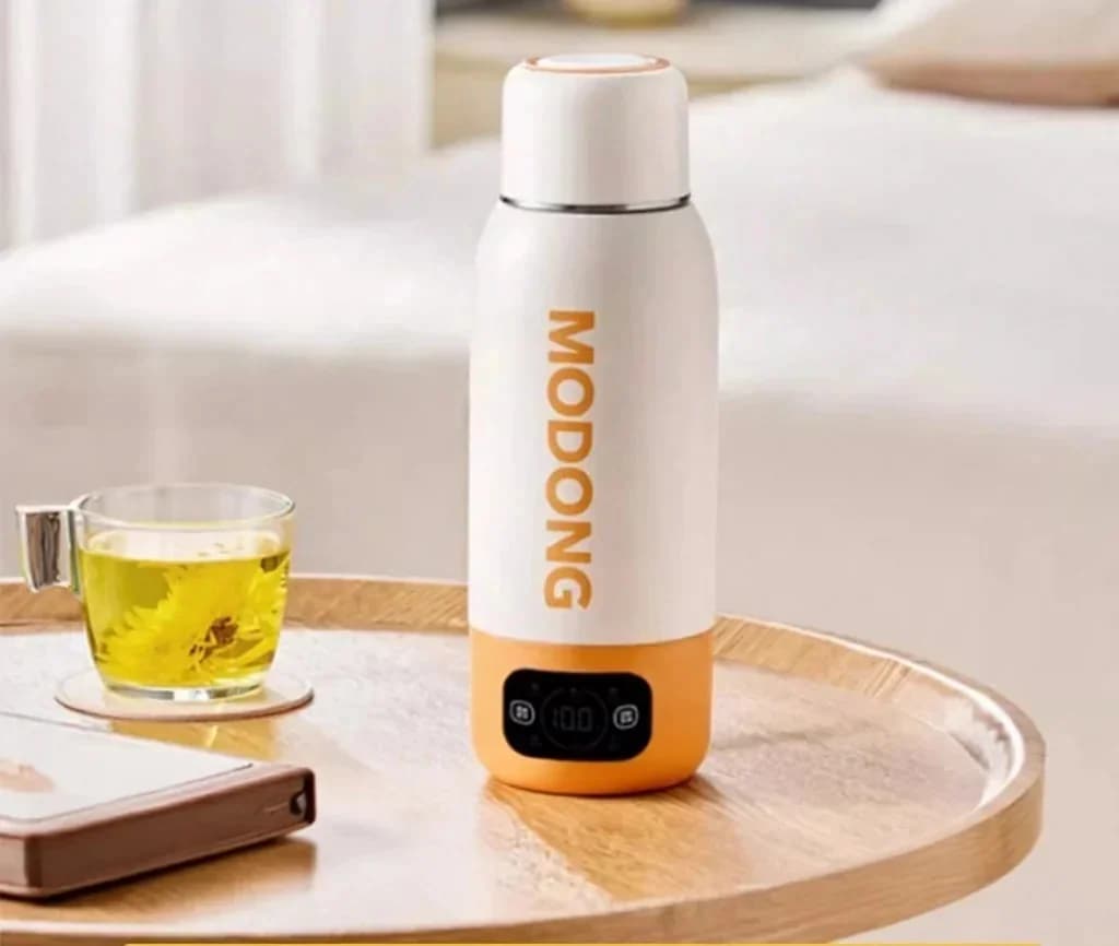 แก้วกาต้มน้ำไฟฟ้าแบบพกพา 600ml ซับในสเตนเลส 316