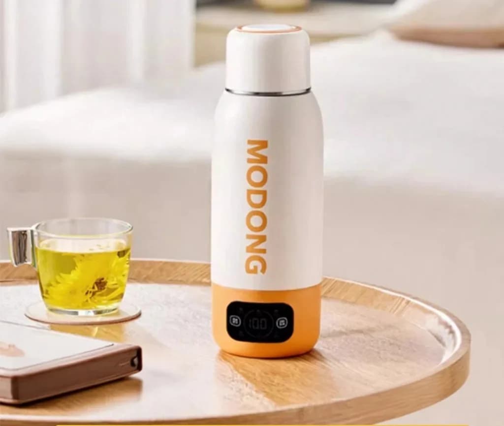 แก้วกาต้มน้ำไฟฟ้าแบบพกพา 600ml ซับในสเตนเลส 316